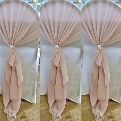 Pale pink chiffon chair drapes