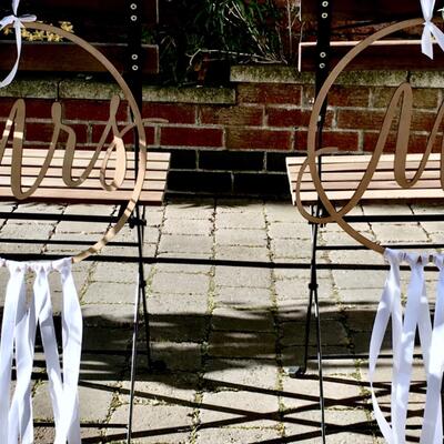 Rustic bride and groom chair hire