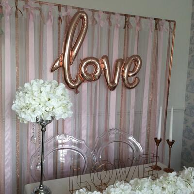 Copper pipe ribbon backdrop