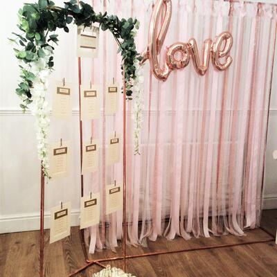 Copper pipe ribbon backdrop