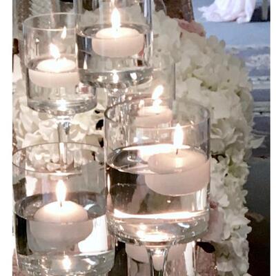 Floating glass candle holders